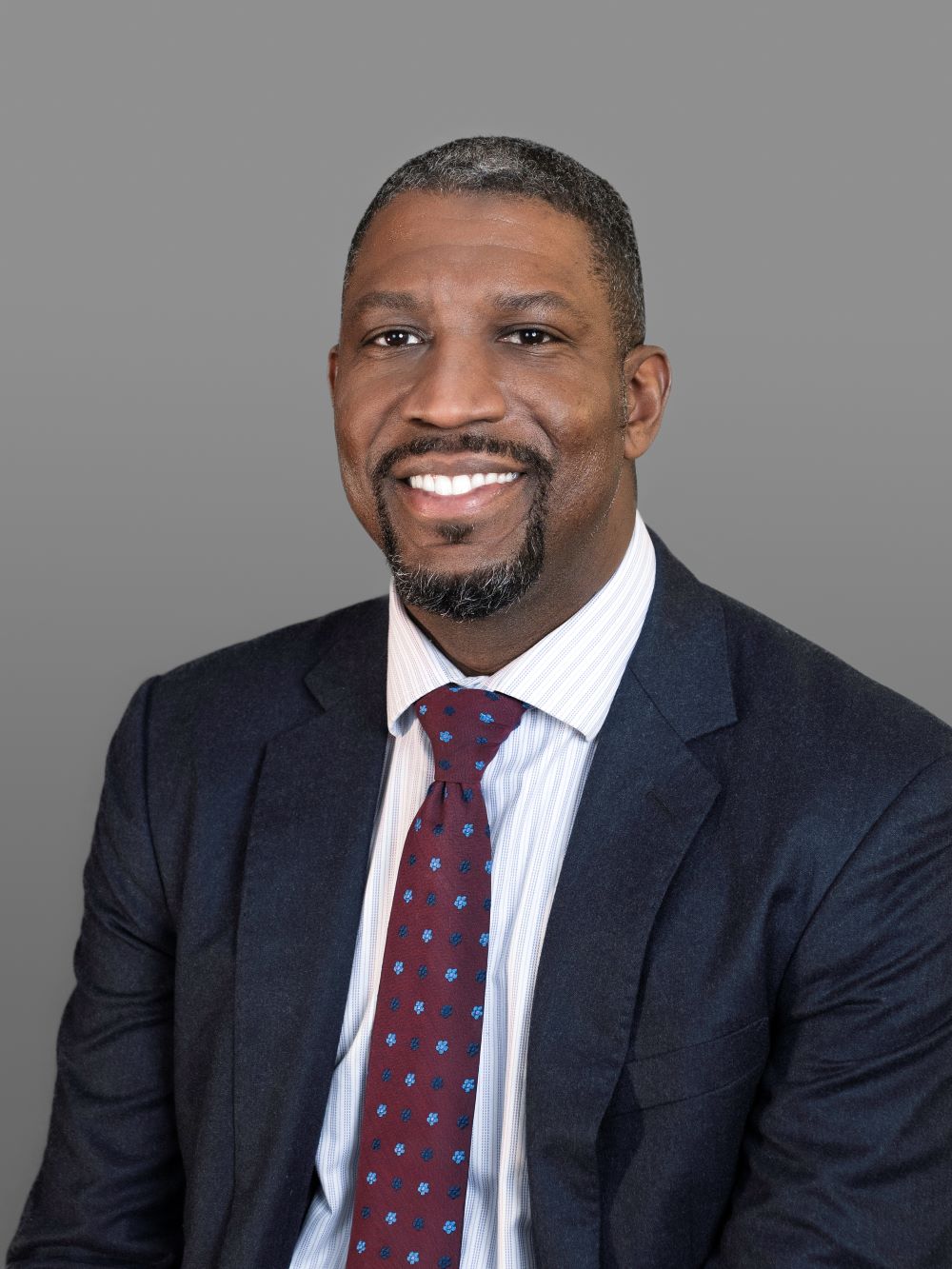 Formal staff photo of City Manager Jason Rogers