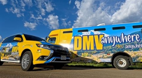 Car and bus with DMV 2 Go Graphic wrap