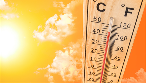 Thermometer with a hot sun image. 