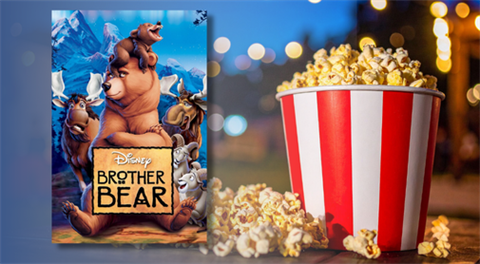 Brother Bear poster next to a bucket of popcorn