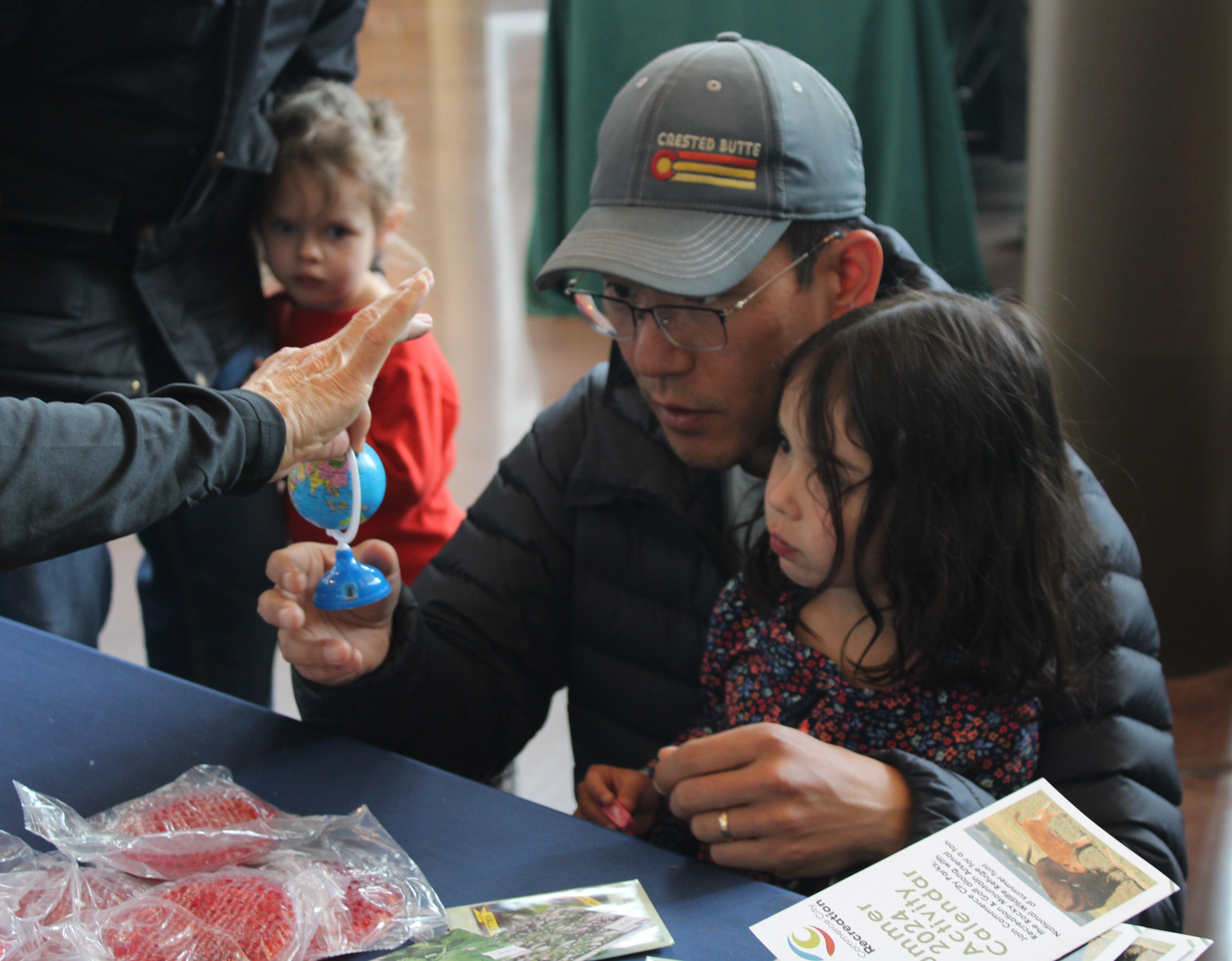 family at info table