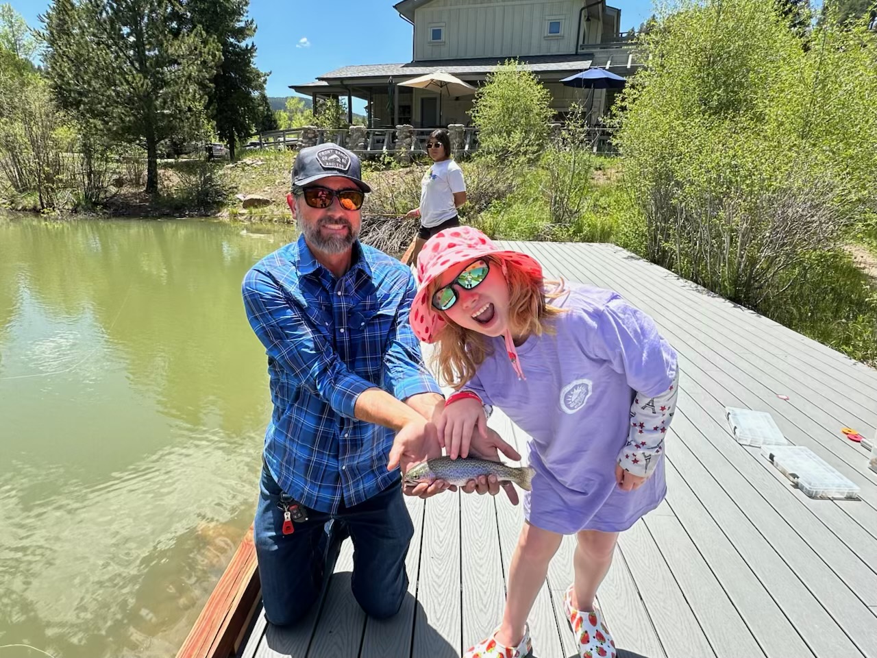Man and girl with fish
