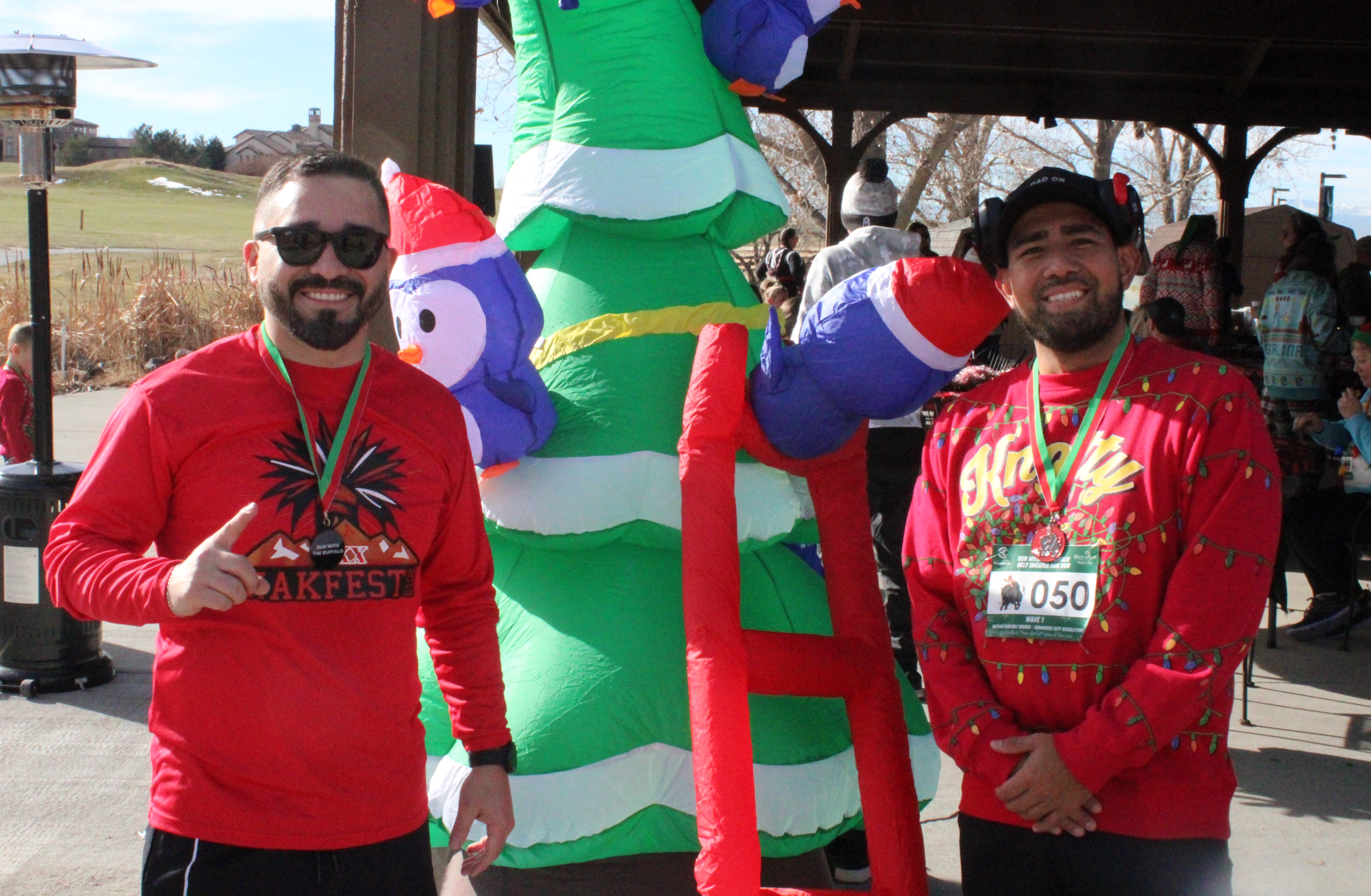 Runners with ugly sweaters and holiday decorations