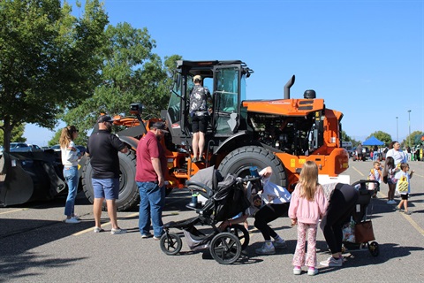 families at touch a truck